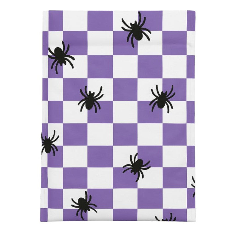Checkered shipping bags with purple and white squares and black spiders on a white background